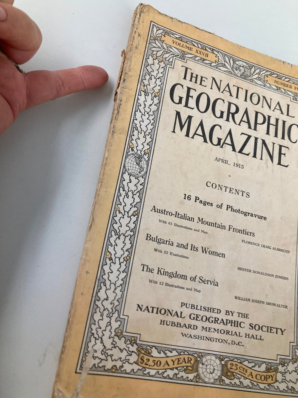 Close-up view of the cover of VTG The National Geographic Magazine April 1915 highlighting the title and contents.