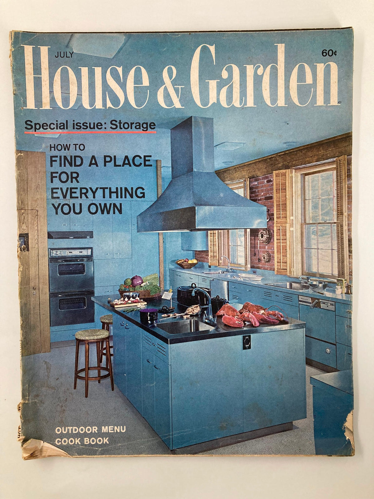 Cover of VTG House & Garden Magazine July 1965 showcasing kitchen design with the theme 'Find A Place For Everything You Own.' Features color photography highlighting a modern kitchen setting.