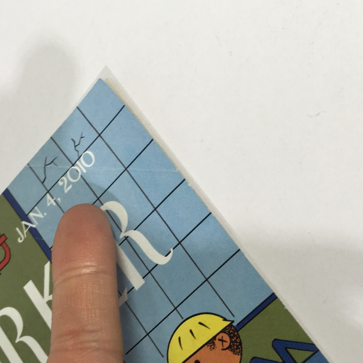 Close-up view of the New Yorker Magazine January 4 2010 cover, detailing the publication date and artwork, highlighting its collectible nature.