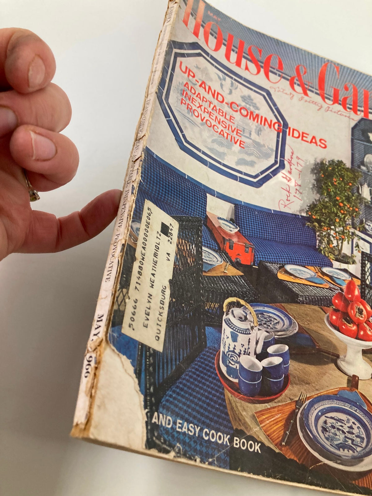 Side view of the May 1966 VTG House & Garden Magazine showcasing its worn spine and colorful front cover that highlights Ingenious Small Houses and innovative design ideas.