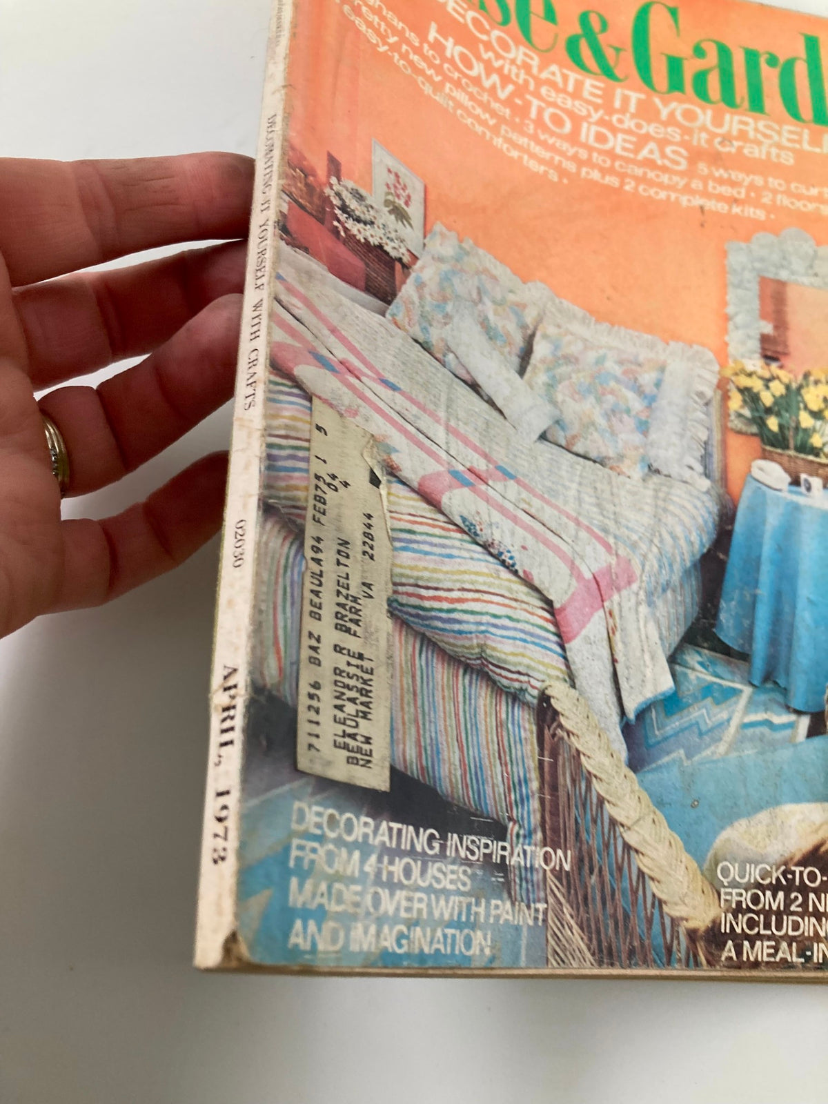 Side view of House & Garden Magazine, April 1973, featuring the title and a glimpse of vintage home decor inspiration.