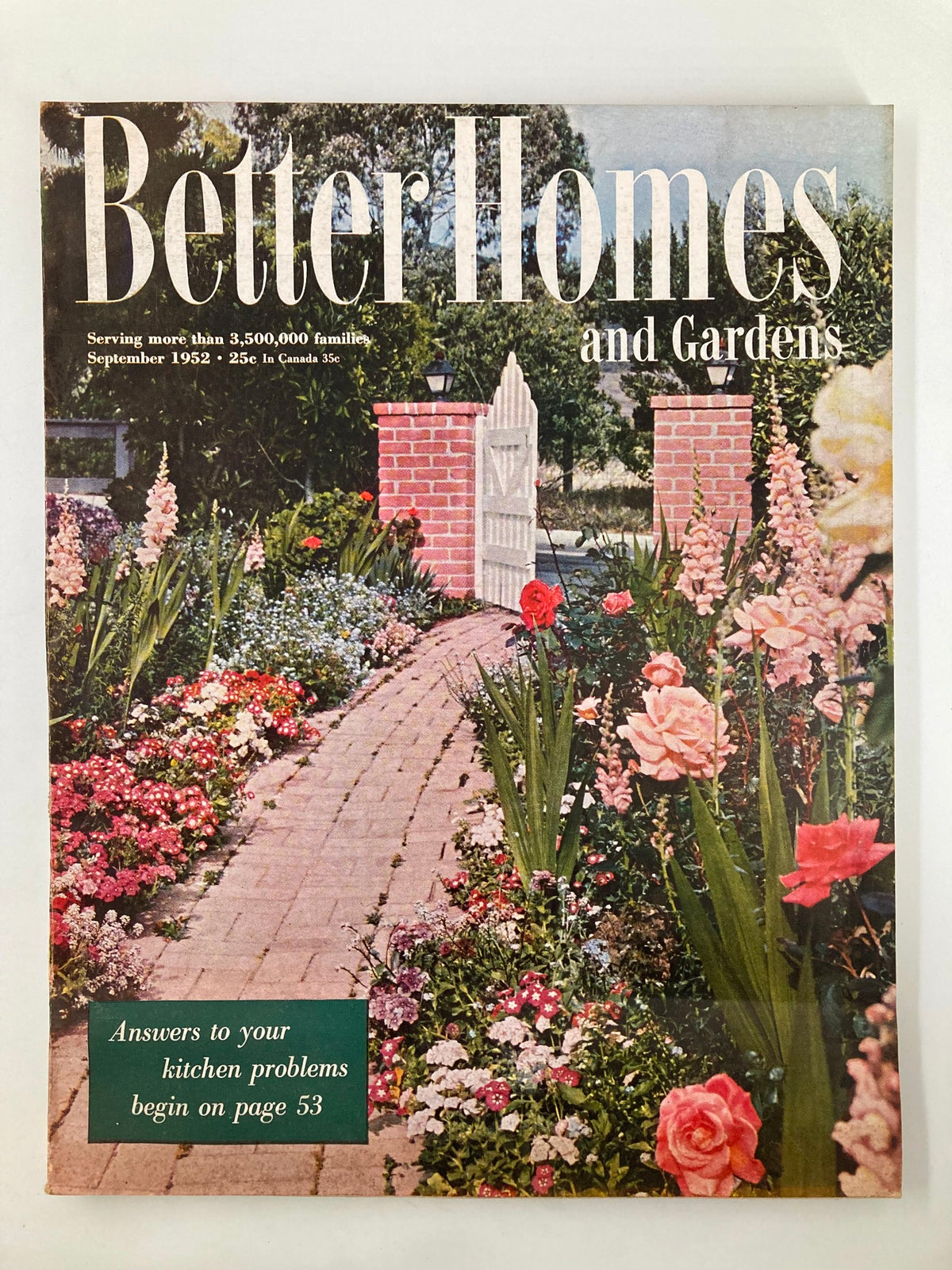 Cover of the VTG Better Homes & Garden Magazine from September 1952, featuring a colorful garden pathway with vibrant flowers and a white picket gate. The magazine's title is prominently displayed.