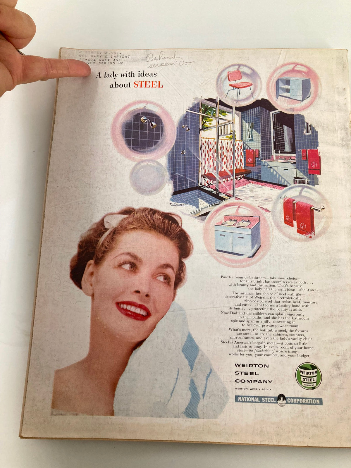 Back cover of the VTG Better Homes & Garden Magazine October 1954 showcasing an advertisement for Weirton Steel with a smiling woman promoting modern home decor ideas.