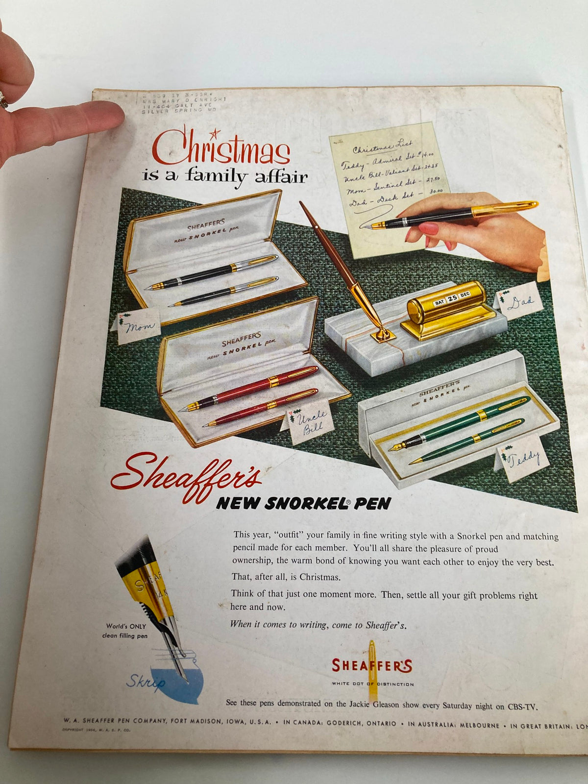 Back cover of the VTG Better Homes & Garden Magazine December 1954 featuring advertisements for Sheaffer’s Snorkel Pen, appealing to holiday gift shopping.
