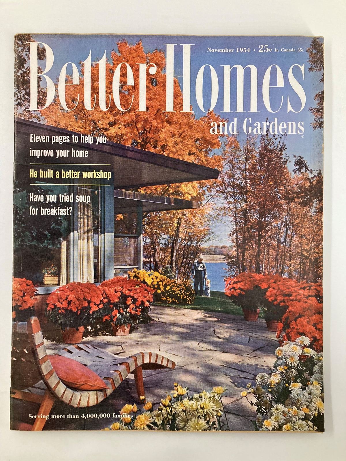 Cover of the VTG Better Homes & Garden Magazine from November 1954 featuring vibrant autumn colors, a cozy outdoor setting with flowers, and the article title 'He Built A Better Workshop.'
