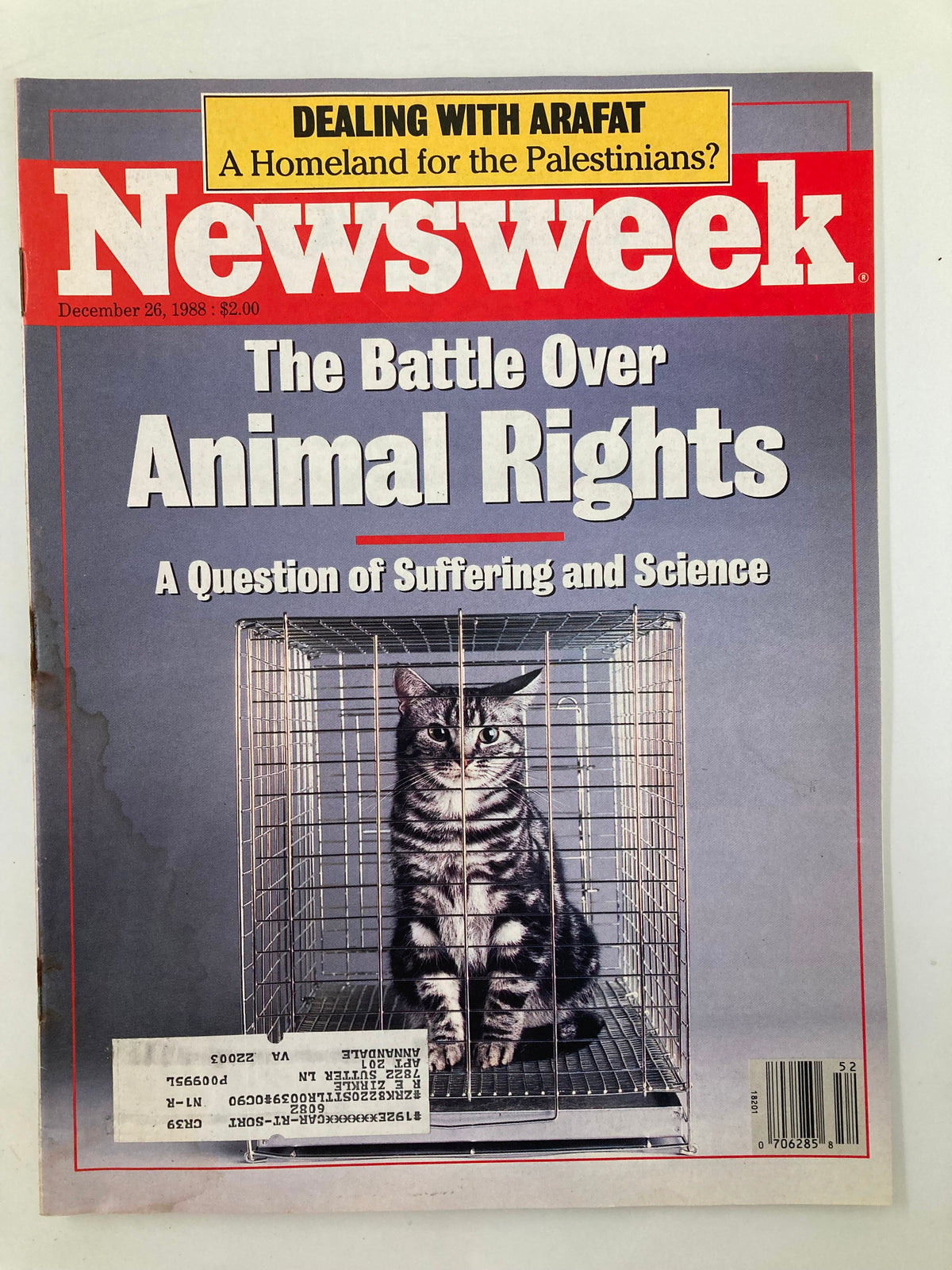 Cover of VTG Newsweek Magazine dated December 26, 1988, featuring a cat in a cage with the headline 'The Battle Over Animal Rights'.