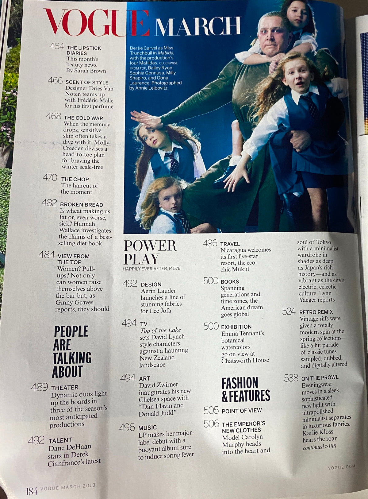 Another interior page of Vogue Magazine March 2013 focusing on cultural commentary and fashion trends, showcasing models in elegant outfits.