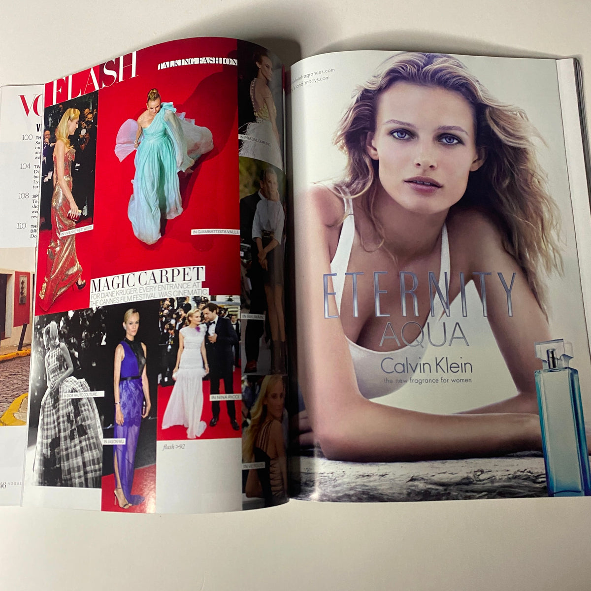 Inside Vogue Magazine August 2012 featuring fashion editorial spreads, including stunning dresses and Calvin Klein perfume advertisement, highlighting Marion Cotillard's cover engagement.