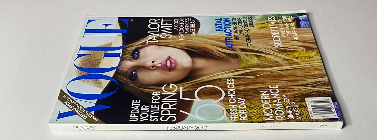 Side view of Vogue Magazine February 2012 with Taylor Swift on the cover, emphasizing spring fashion updates and contemporary style.