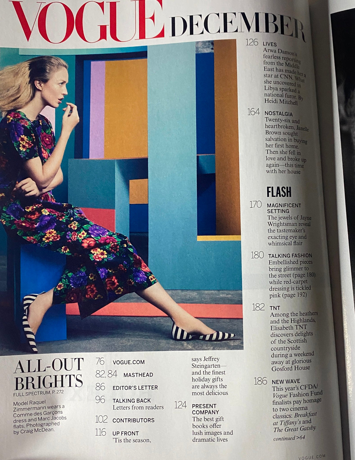 Inside page of Vogue Magazine December 2012 showcasing the editorial layout and highlights of 'All-Out Brights', featuring fashion contributions and photography details.