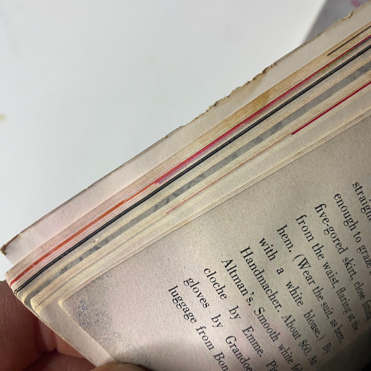 Image showing the edge of the pages from Harper's Bazaar Magazine December 1960 Thomas Merton No Label GD Interior, showcasing the colorful page edges.