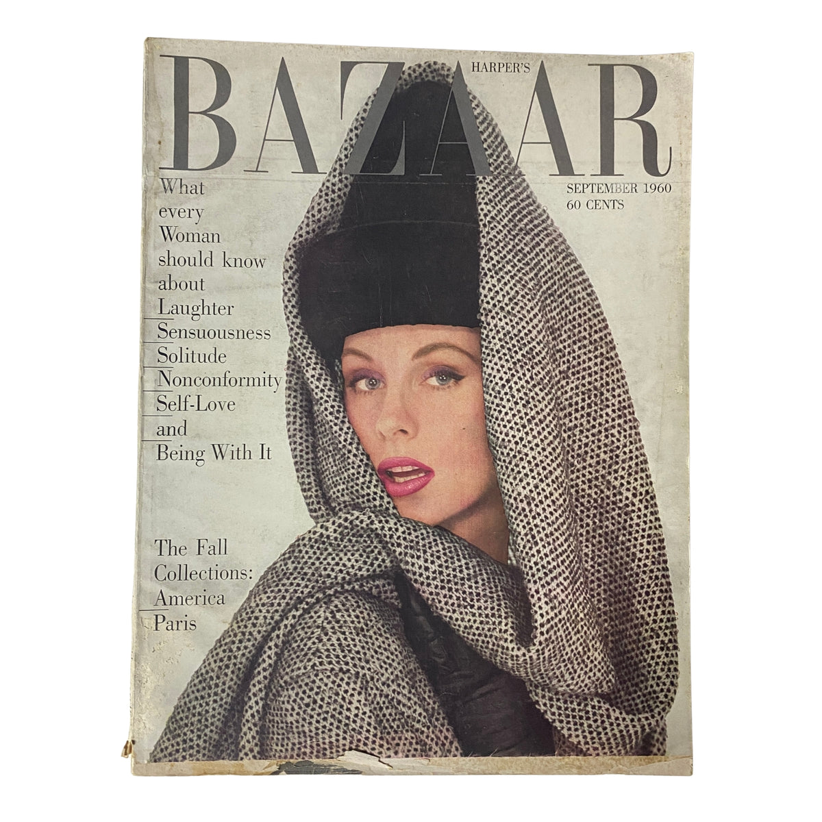 Cover of Harper's Bazaar Magazine, September 1960, featuring a model in a grey scarf and hat, representing the America Paris Fall Collections.
