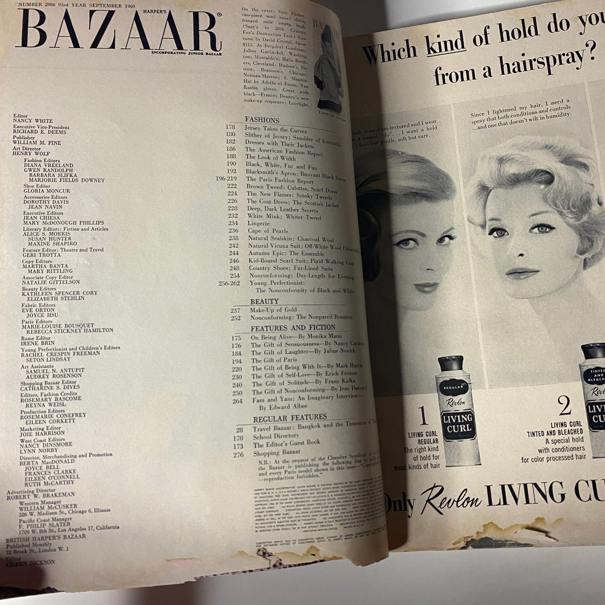 Interior page from Harper's Bazaar Magazine September 1960 featuring fashion editorials and haircare advertisement with models. Highlights the America Paris Fall Collections.