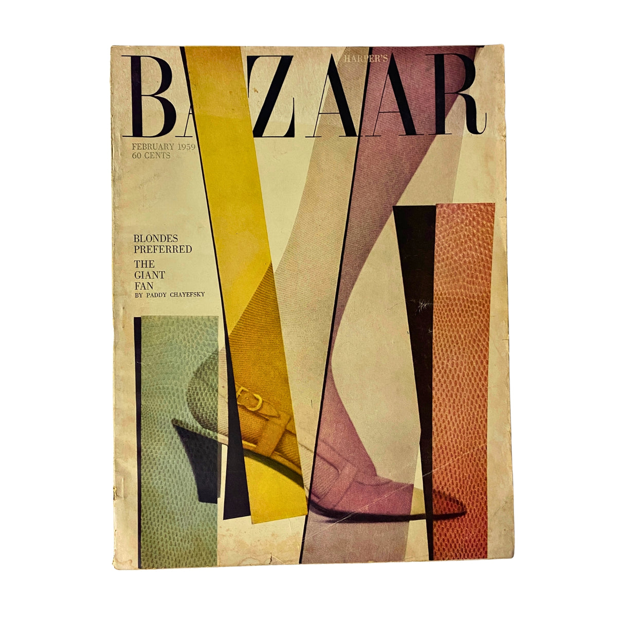 Harper's Bazaar Magazine February 1959 cover featuring vibrant pastel designs and high heel shoes. The issue titled 'The Giant Fan' by Paddy Chayefsky, highlighting the fashion theme of blonde tones.