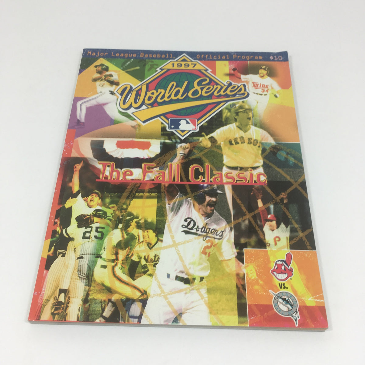 1997 World Series Fall Classic Major League Baseball Official Program featuring vibrant graphics and iconic baseball imagery.