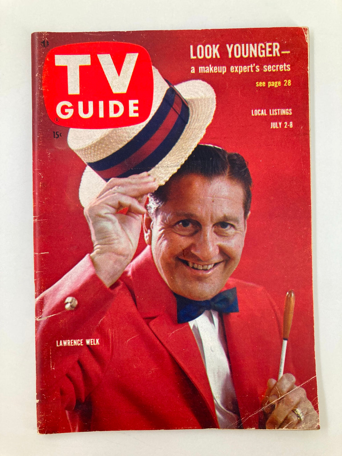 TV Guide Magazine July 2 1960 featuring Lawrence Welk on the cover, holding a straw hat and smiling, showcasing the vibrant style of the early 1960s.