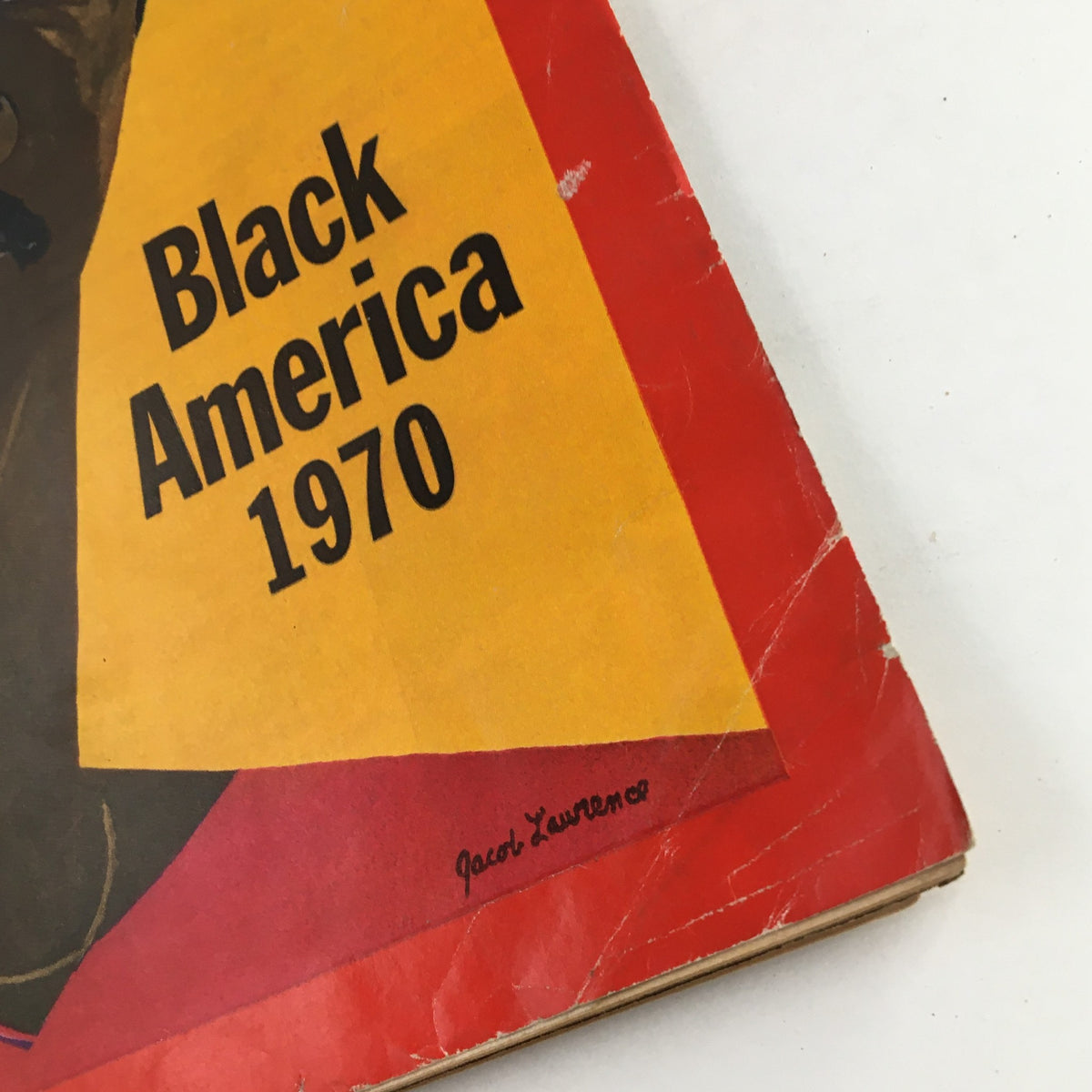 Detail shot of the cover of Time Magazine April 6 1970, featuring the title 'Black America 1970' and the artist's signature, showcasing its historical significance.