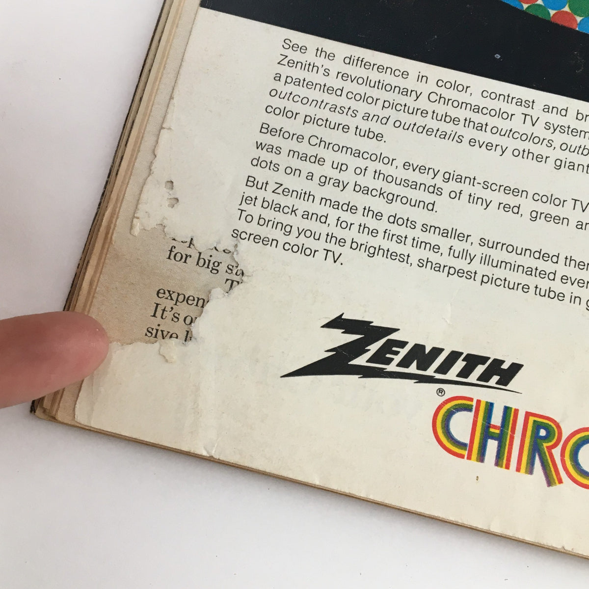 Close-up of the lower portion of the back cover of Time Magazine April 6 1970, highlighting a small rip near the Zenith Chromacolor logo and text describing the innovative television technology.