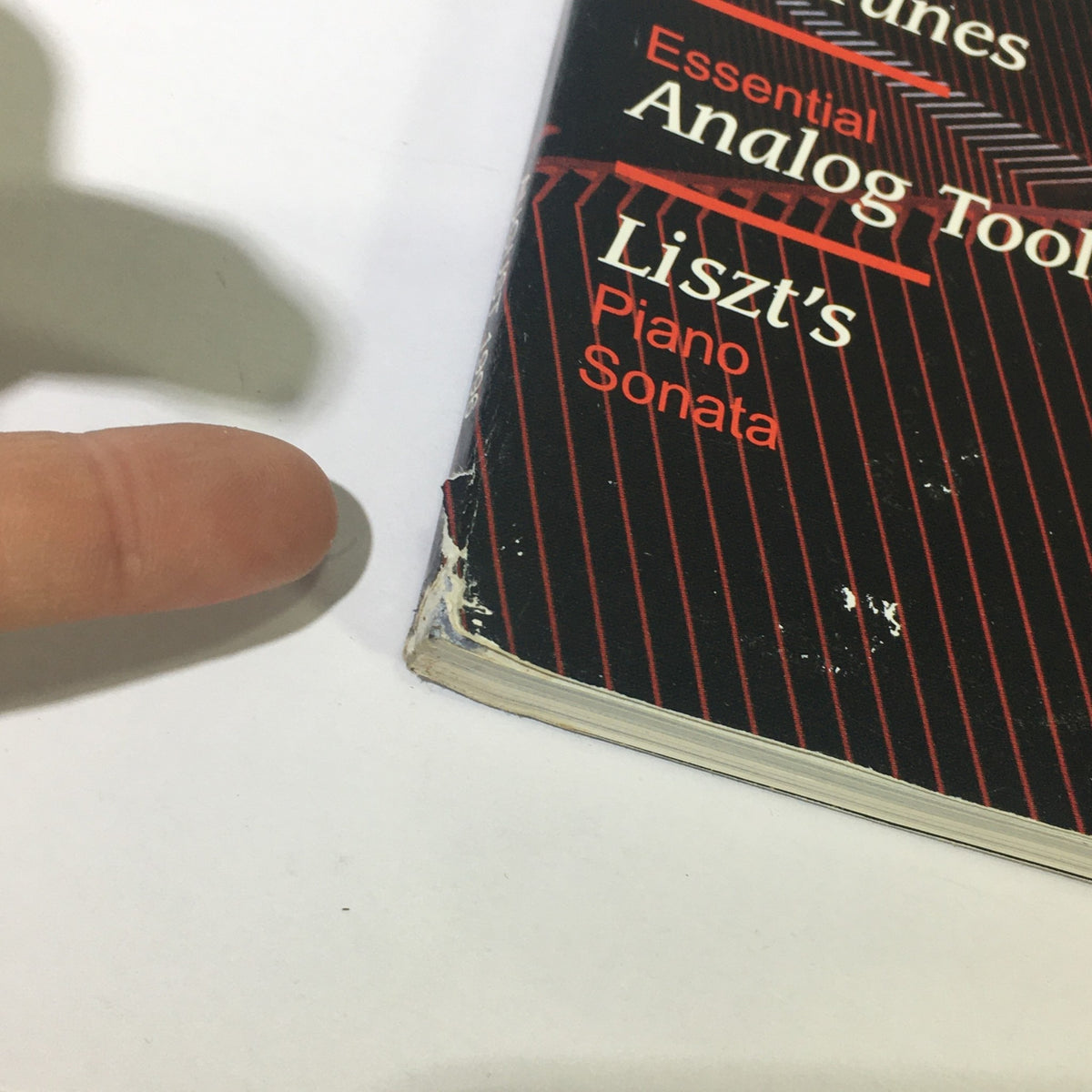 Close-up of the spine of Stereophile Magazine August 1996, showing minor wear, highlighting the title 'Liszt's Piano Sonata'.