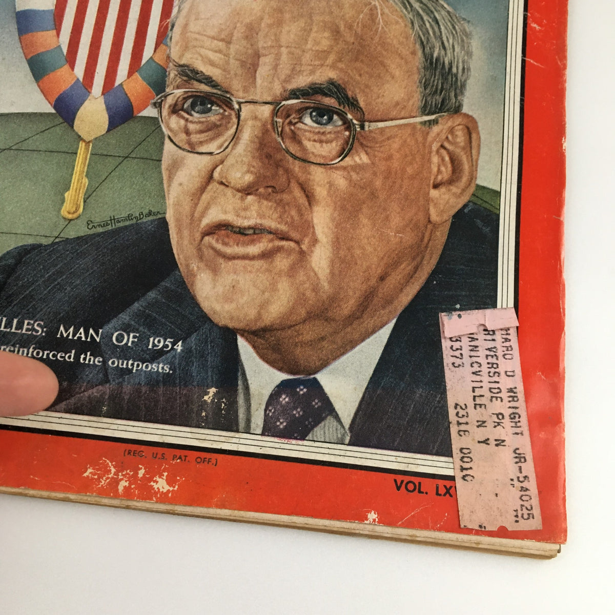Detailed view of Time Magazine cover from January 3, 1955, highlighting John Foster Dulles as Man of the Year. Close-up of Dulles with the caption 'He reinforced the outposts' and visible vintage address label.