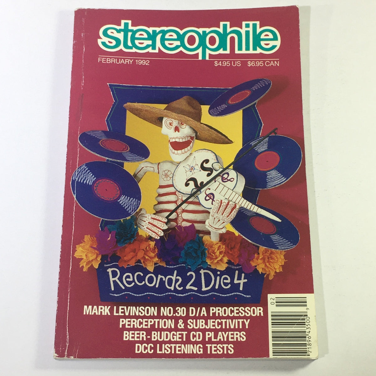 Cover of Stereophile Magazine February 1992 featuring Mark Levinson No. 30 D/A Processor Review, showcasing art with a skeleton, vinyl records, and flowers. The magazine highlights topics like perception & subjectivity, beer-budget CD players, and DCC listening tests.