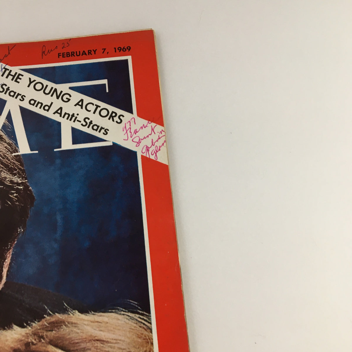 Close-up of Time Magazine cover dated February 7, 1969, showcasing Dustin Hoffman and Mia Farrow, displaying handwritten annotations and the magazine's logo.