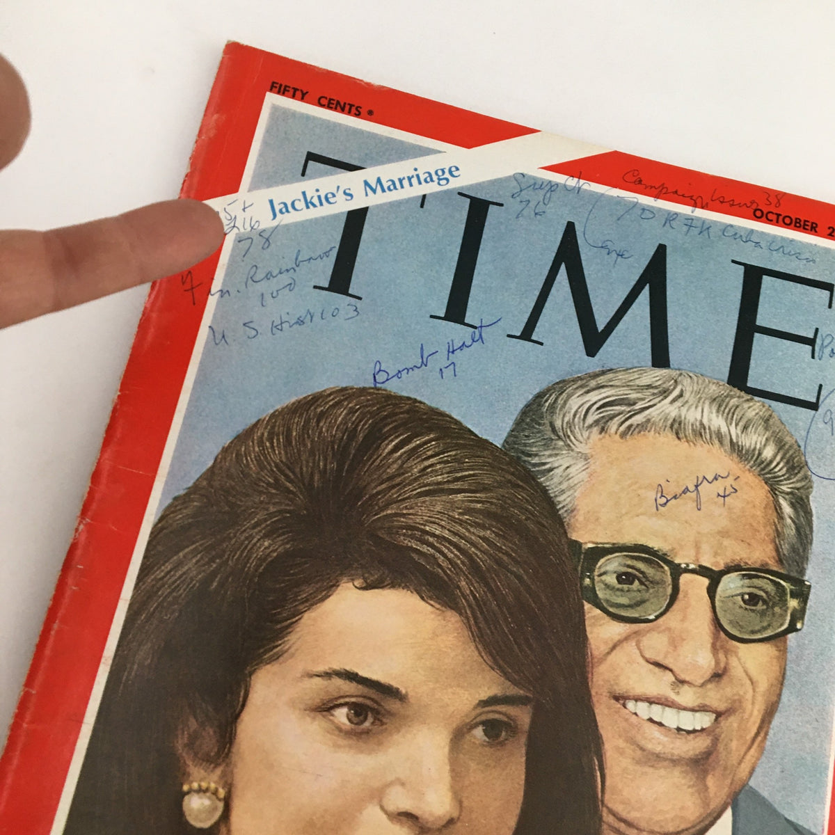 Close-up of the Time Magazine cover from October 25, 1968, displaying Jacqueline Kennedy's Marriage with handwritten notes and annotations.