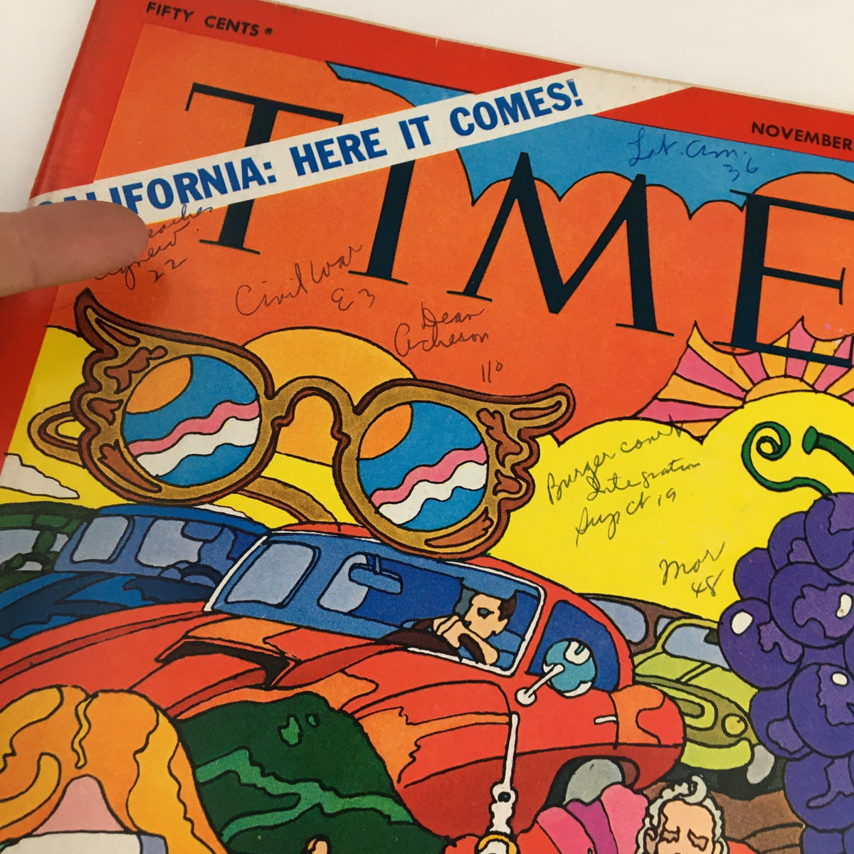 Close-up of the Time Magazine cover from November 7, 1969, showing details of the colorful designs associated with the article 'California, Here It Comes.' The cover features artistic elements such as large sunglasses and other retro motifs.