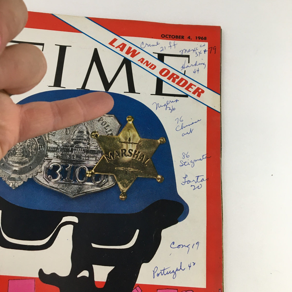 Detailed view of the Time Magazine October 4 1968 Vol. 92 No. 14 cover showcasing the police star badge and handwritten notes, reflecting the significance of law enforcement during the era.