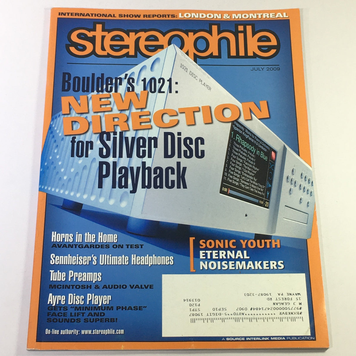 Cover of Stereophile Magazine July 2009 featuring the title 'Boulder's 1021: New Direction for Silver Disc Playback'. Highlights include reviews on high-end audio equipment and articles on Sennheiser headphones and tube amplifiers.