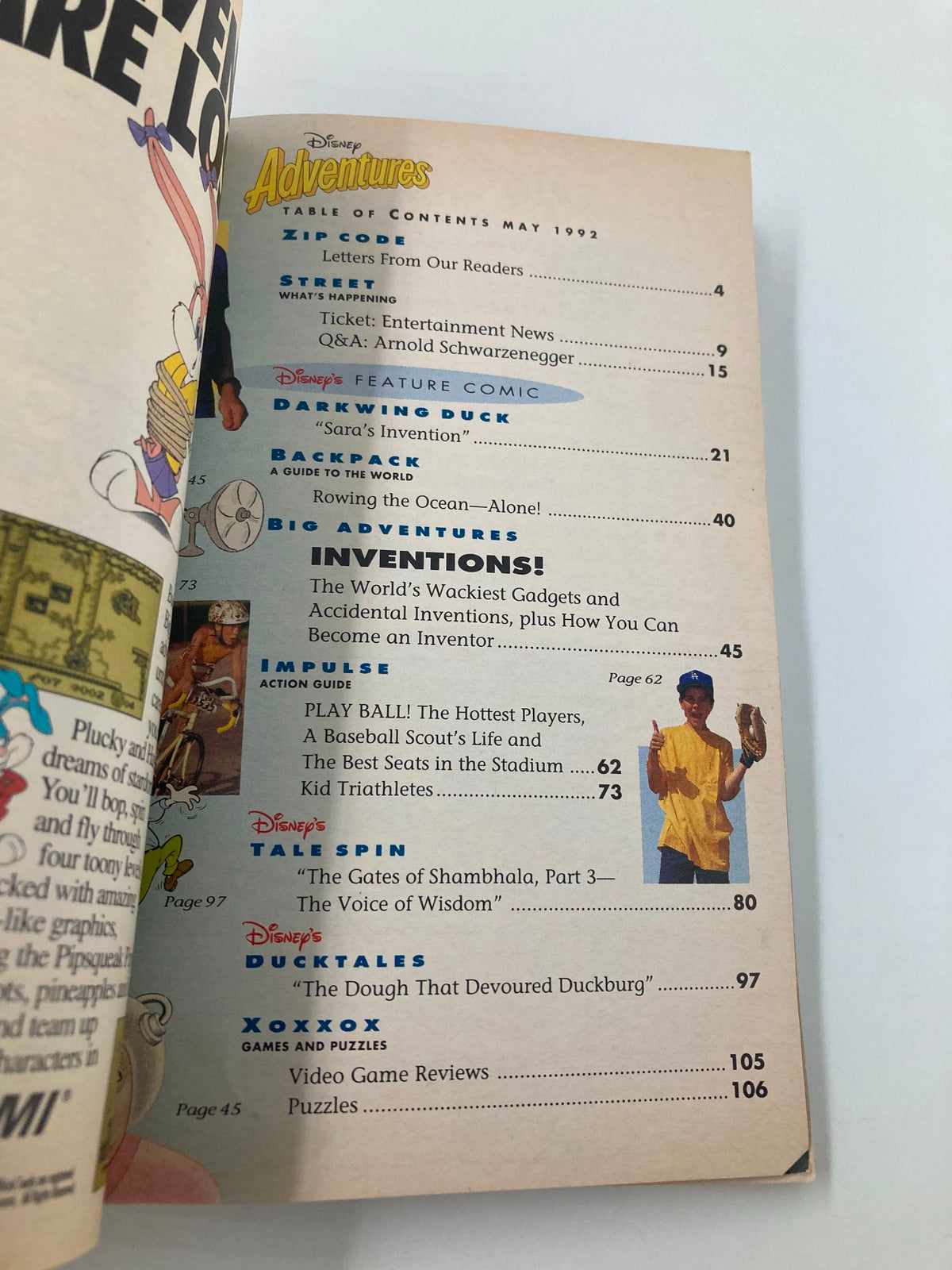 Table of contents from Disney Adventures Magazine May 1992, showcasing articles and features including Darkwing Duck and a Q&A with Arnold Schwarzenegger.