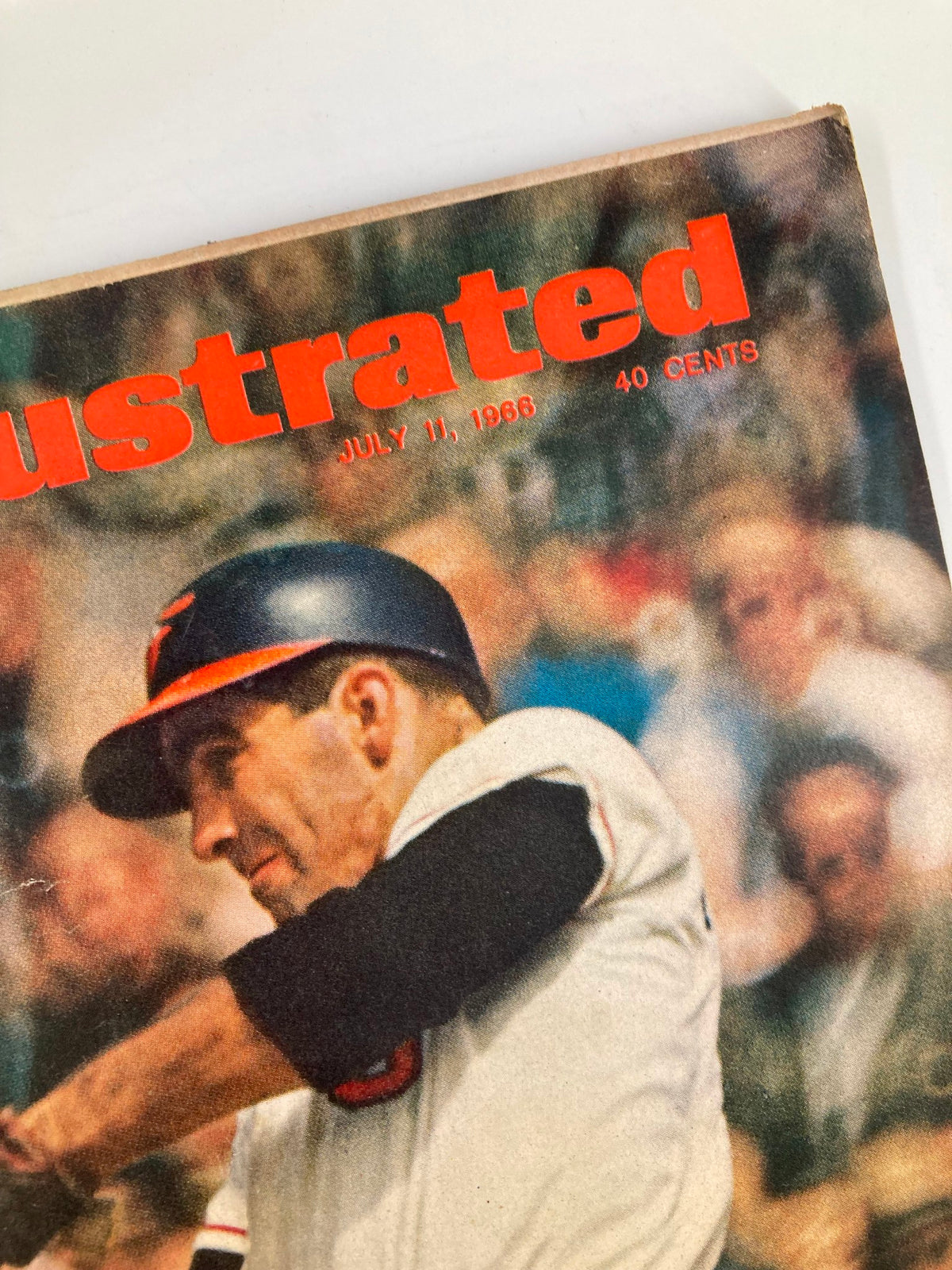 Close-up of the cover of VTG Sports Illustrated Magazine July 11 1966, highlighting Baltimore's Andy Etchebarren along with the magazine's title and publication date.