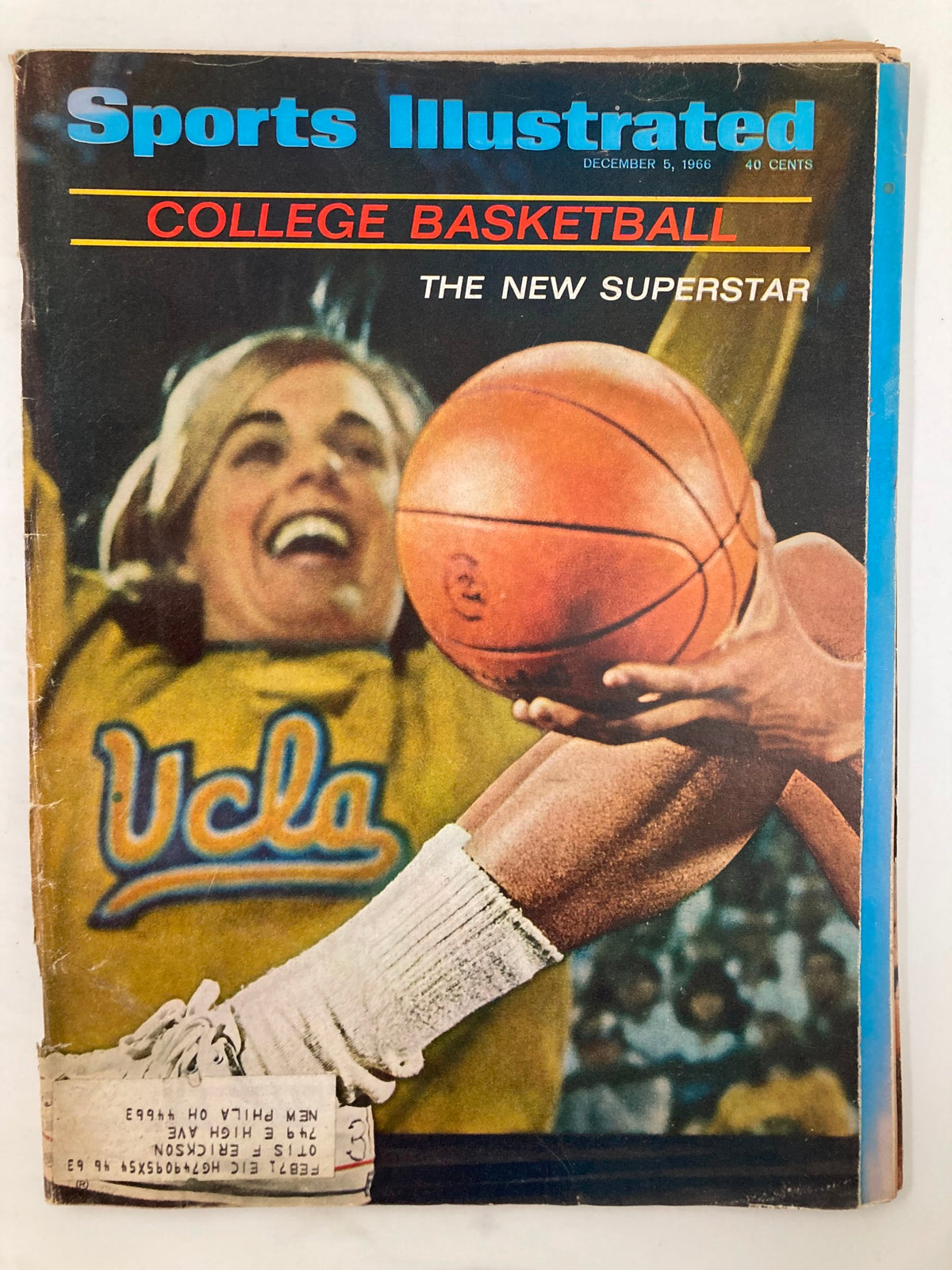 Vintage Sports Illustrated Magazine from December 5, 1966 featuring college basketball, showcasing a player with a basketball, highlighting the excitement of college sports and the emergence of star athletes.