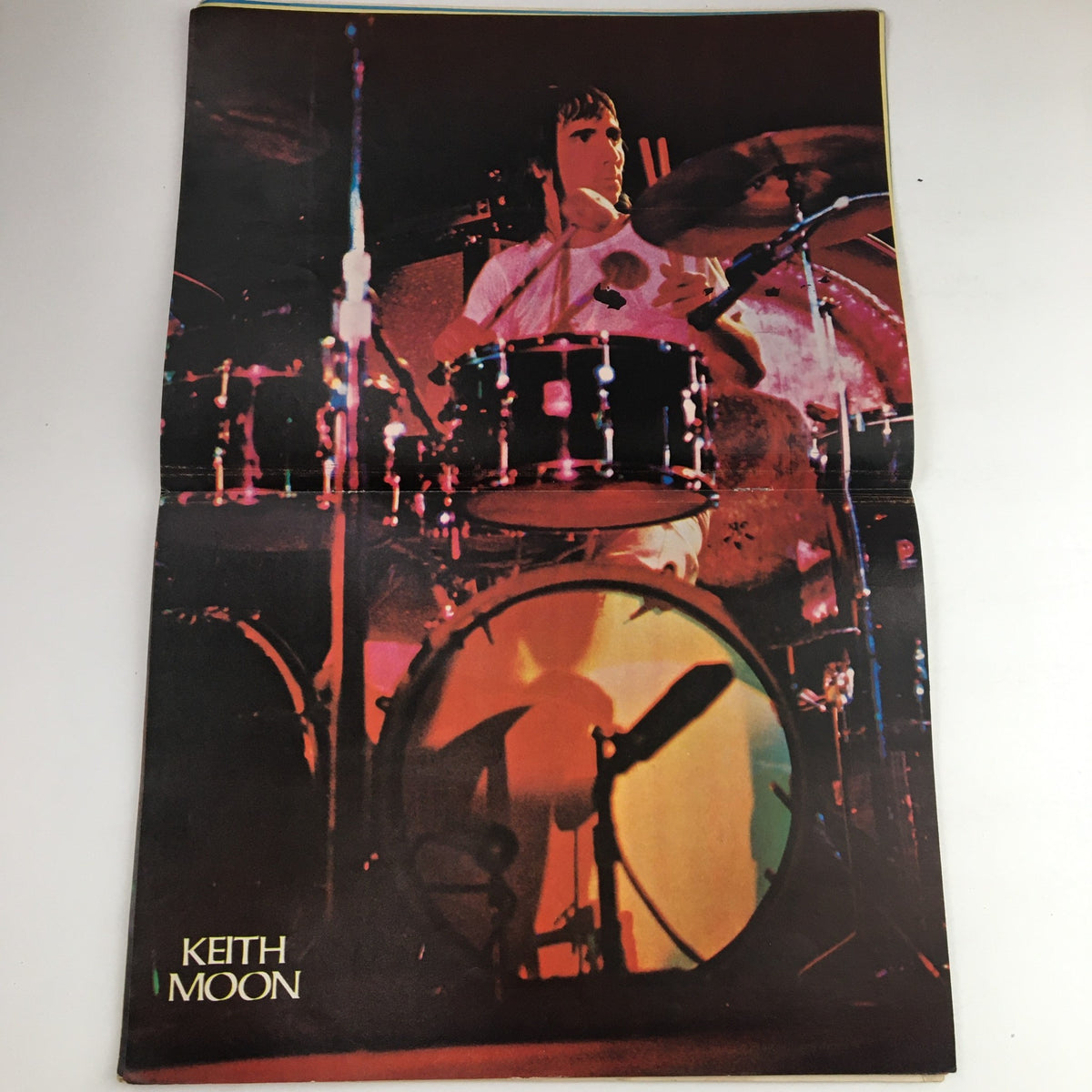 Poster of Keith Moon featured in Hit Parader Magazine January 1973, showcasing the iconic drummer in a vibrant performance.