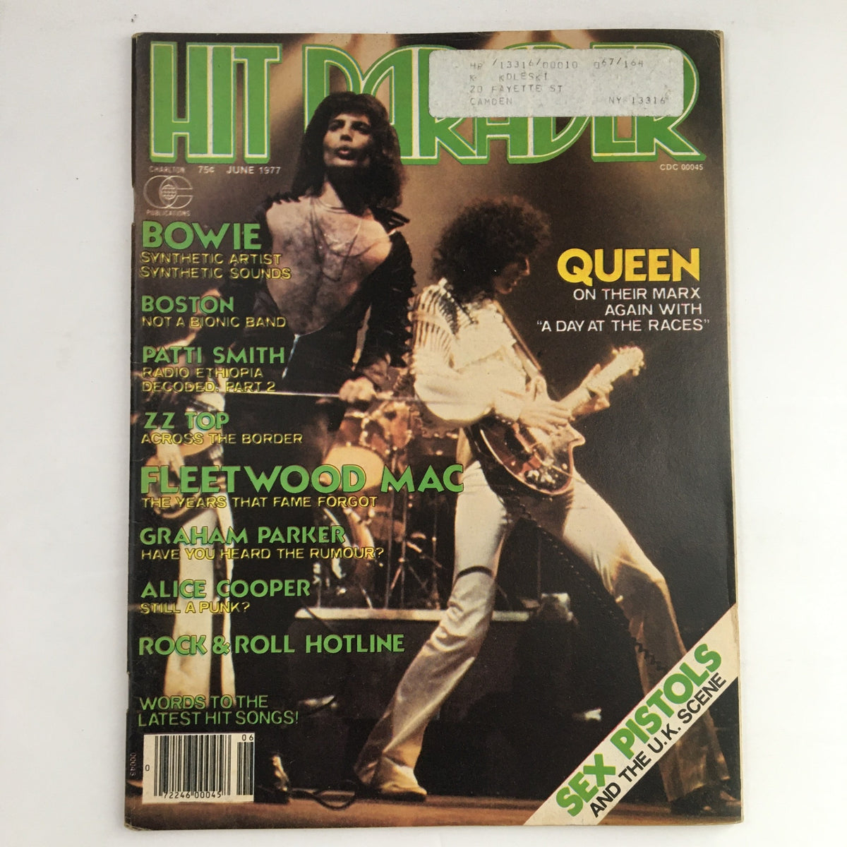 Cover of Hit Parader Magazine June 1977 featuring Queen with Freddie Mercury and Brian May, showcasing iconic rock artists in vibrant style.