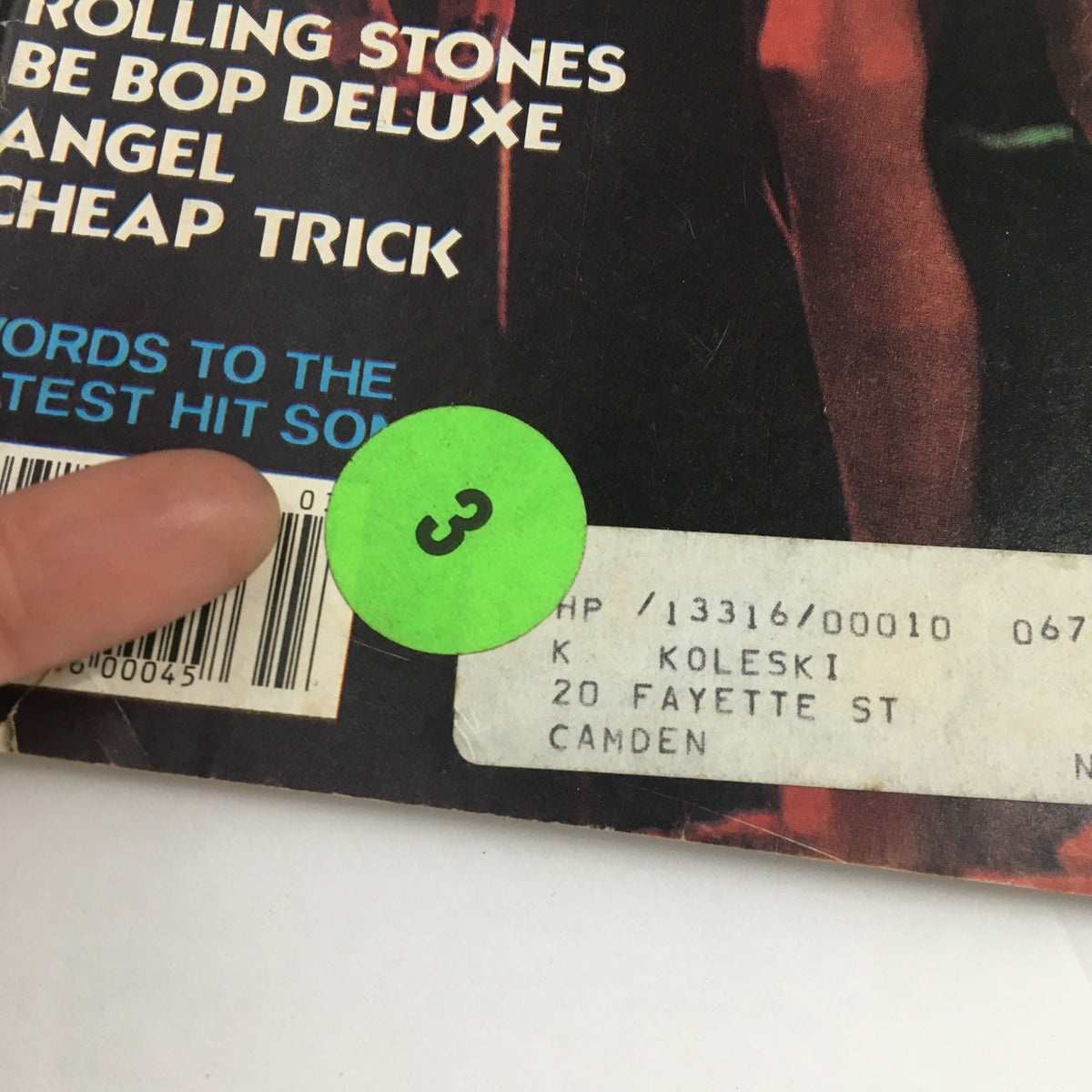 Back cover of Hit Parader Magazine March 1978 with a close-up of the address label and a green sticker, indicating the magazine's collectible status.