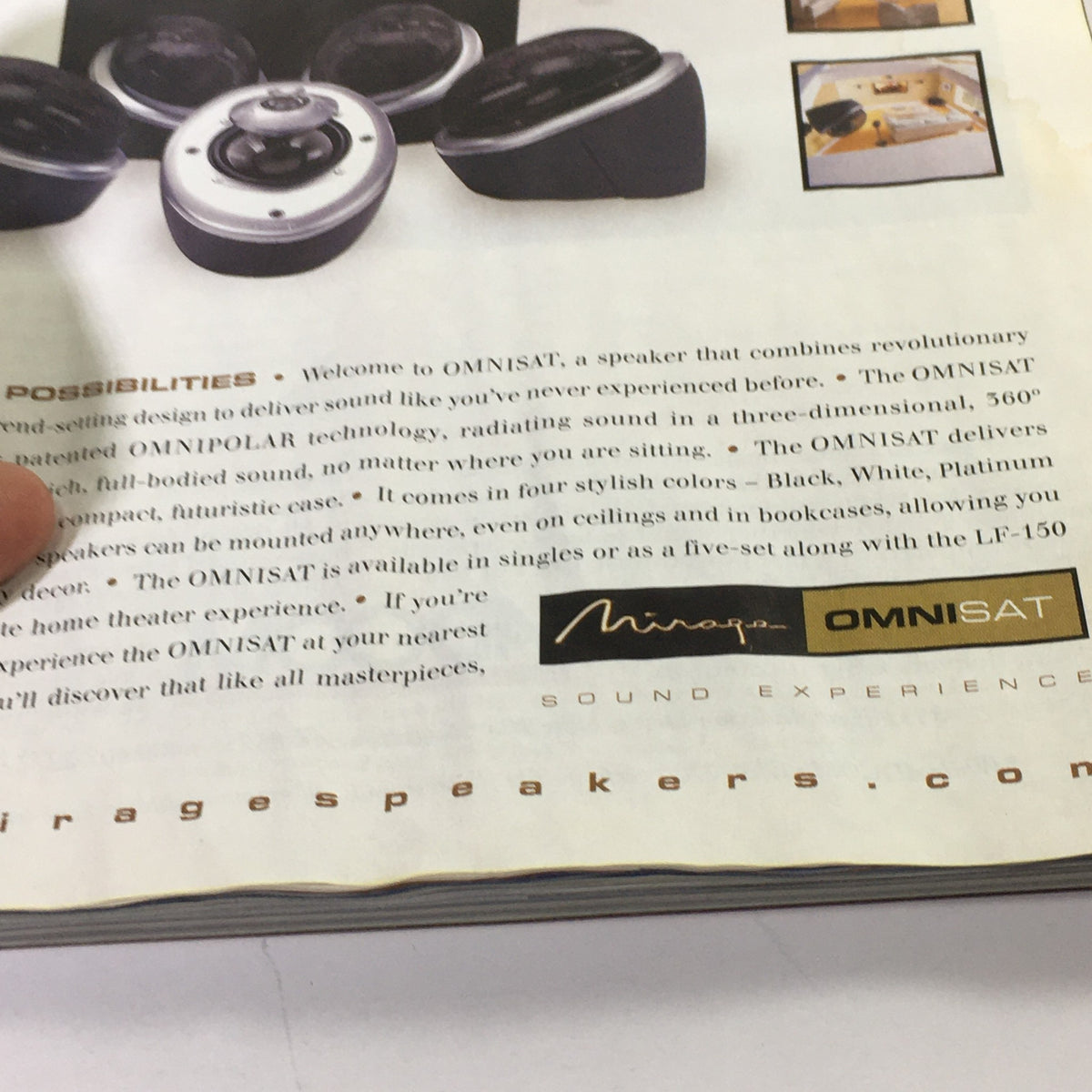 Inside page of Stereophile Magazine October 2002 showcasing an advertisement for the OMNISAT speaker, highlighting its revolutionary design and features.