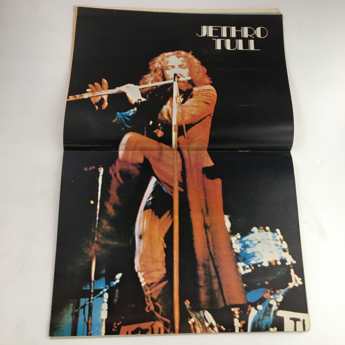 Fold-out poster from Hit Parader Magazine March 1973 featuring Jethro Tull performing live, capturing a legendary moment in music history.