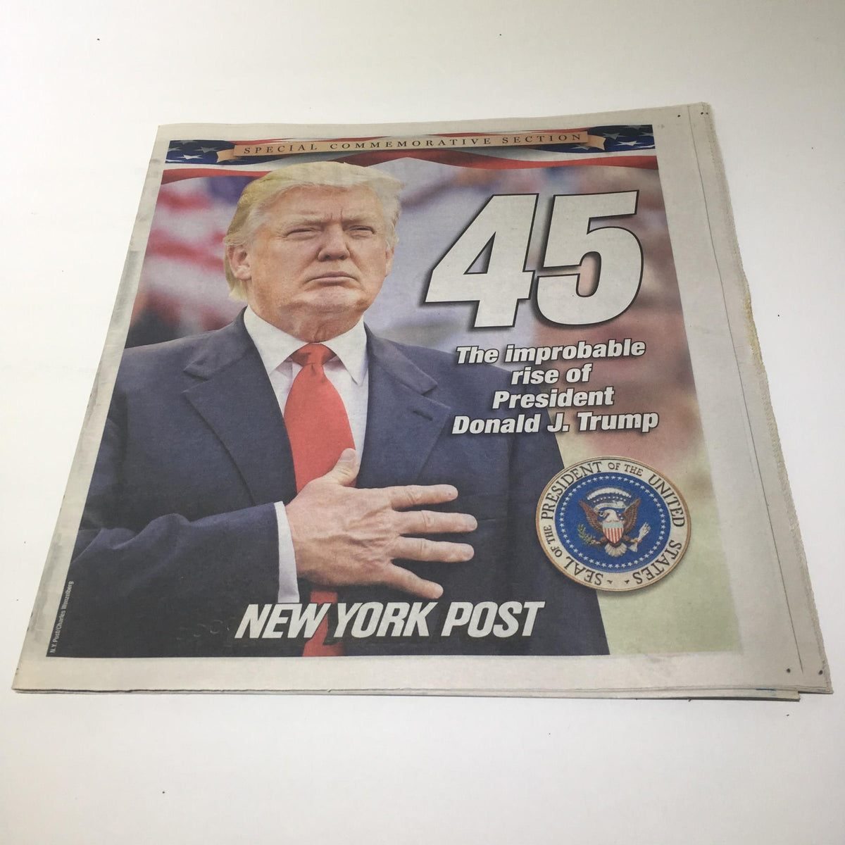 Cover of NY York Post: January 2017, featuring Donald Trump with the headline 'The Improbable Rise of President Donald J. Trump' and Presidential Seal.