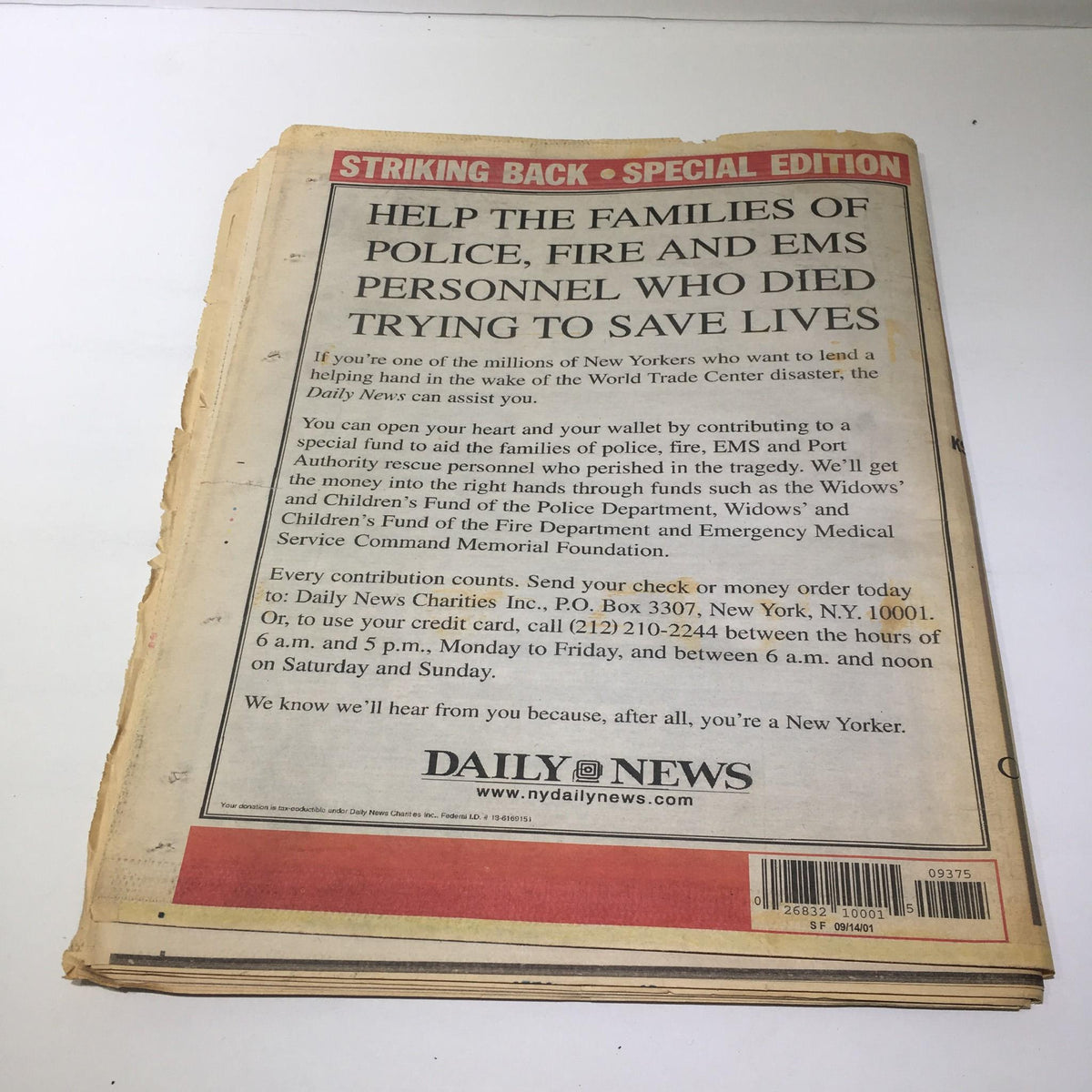 Back page of NY Daily News Special Edition from September 14, 2001, focusing on a message to help families of police, fire, and EMS personnel who died in the 9/11 attacks.