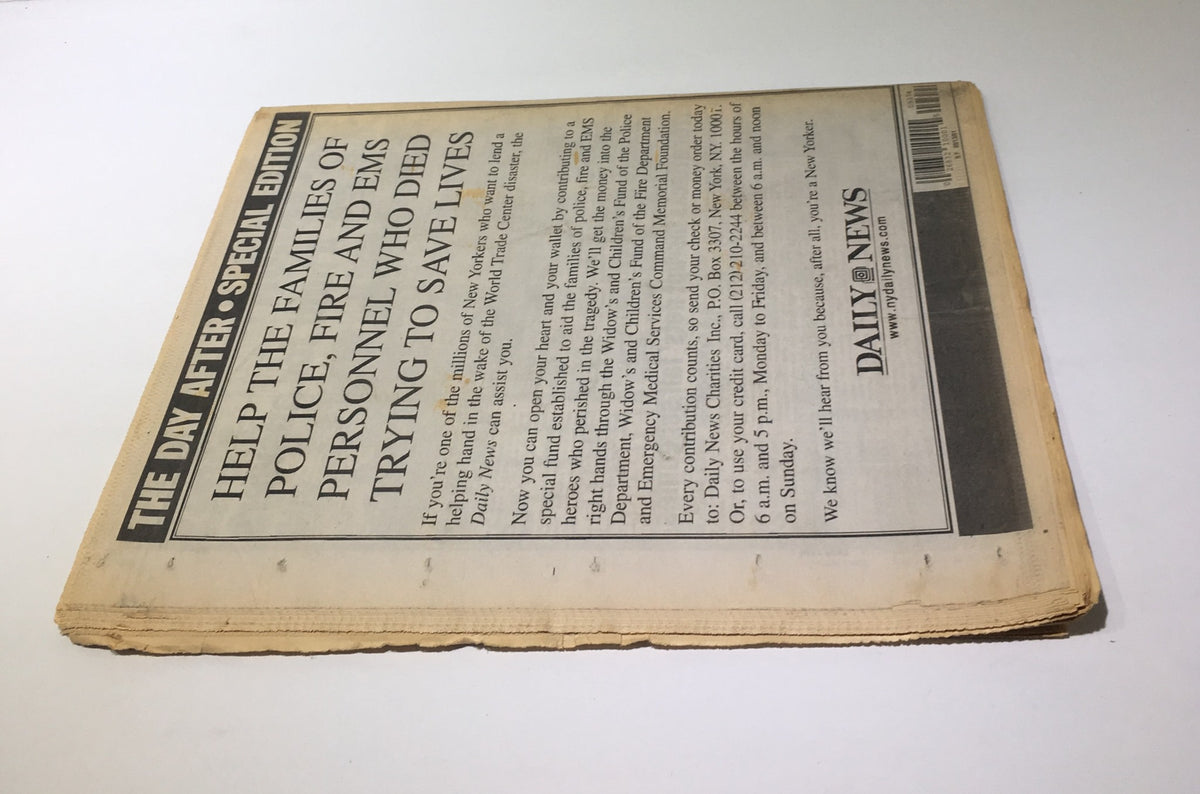 Additional reverse view of the NY Daily News special edition, emphasizing support for families of those who died trying to save lives during the World Trade Center disaster.