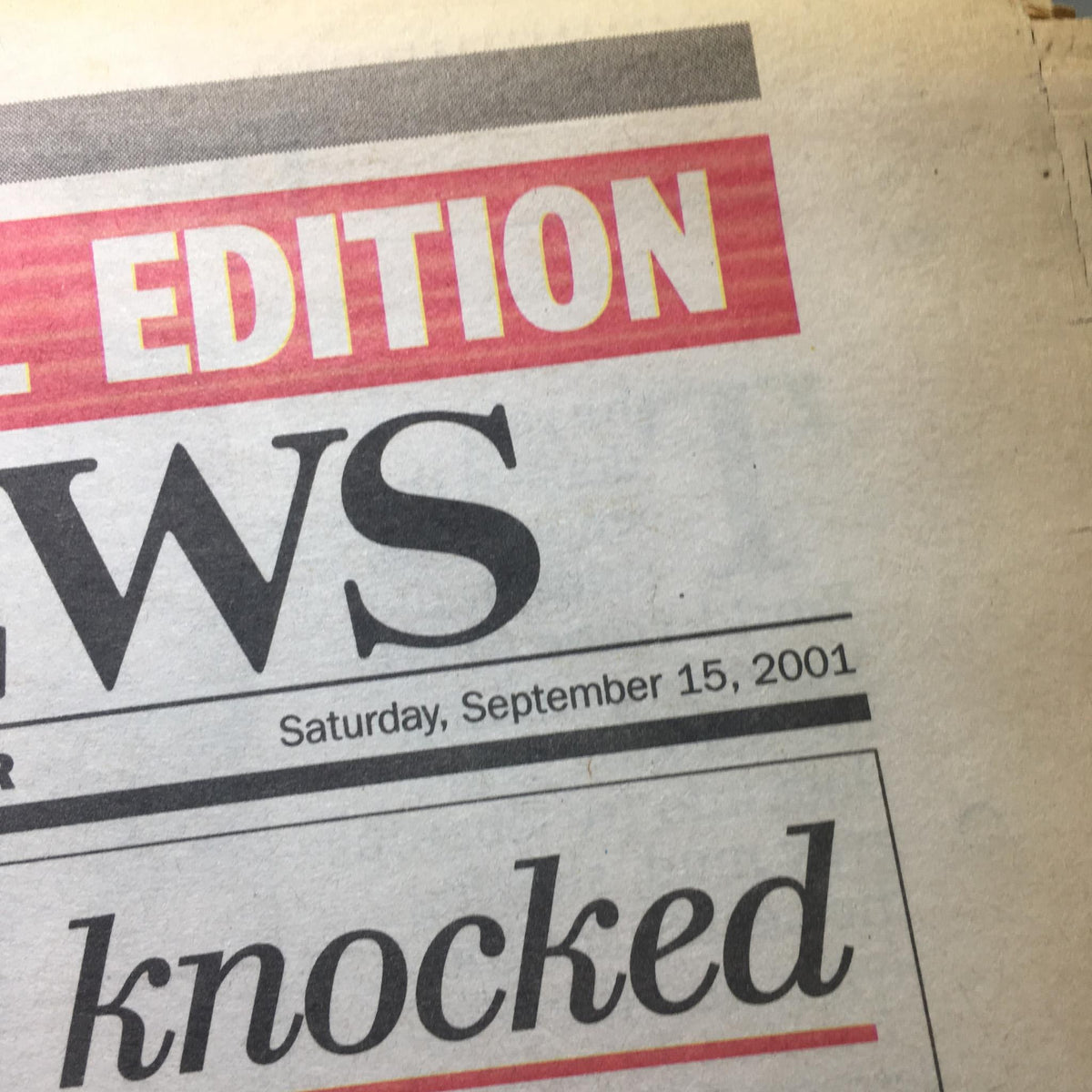 New York Daily 911 President George W Bush Rememberence Special edition. Close-up of the newspaper headline highlighting the edition date, Saturday, September 15, 2001, focusing on the theme of remembrance.