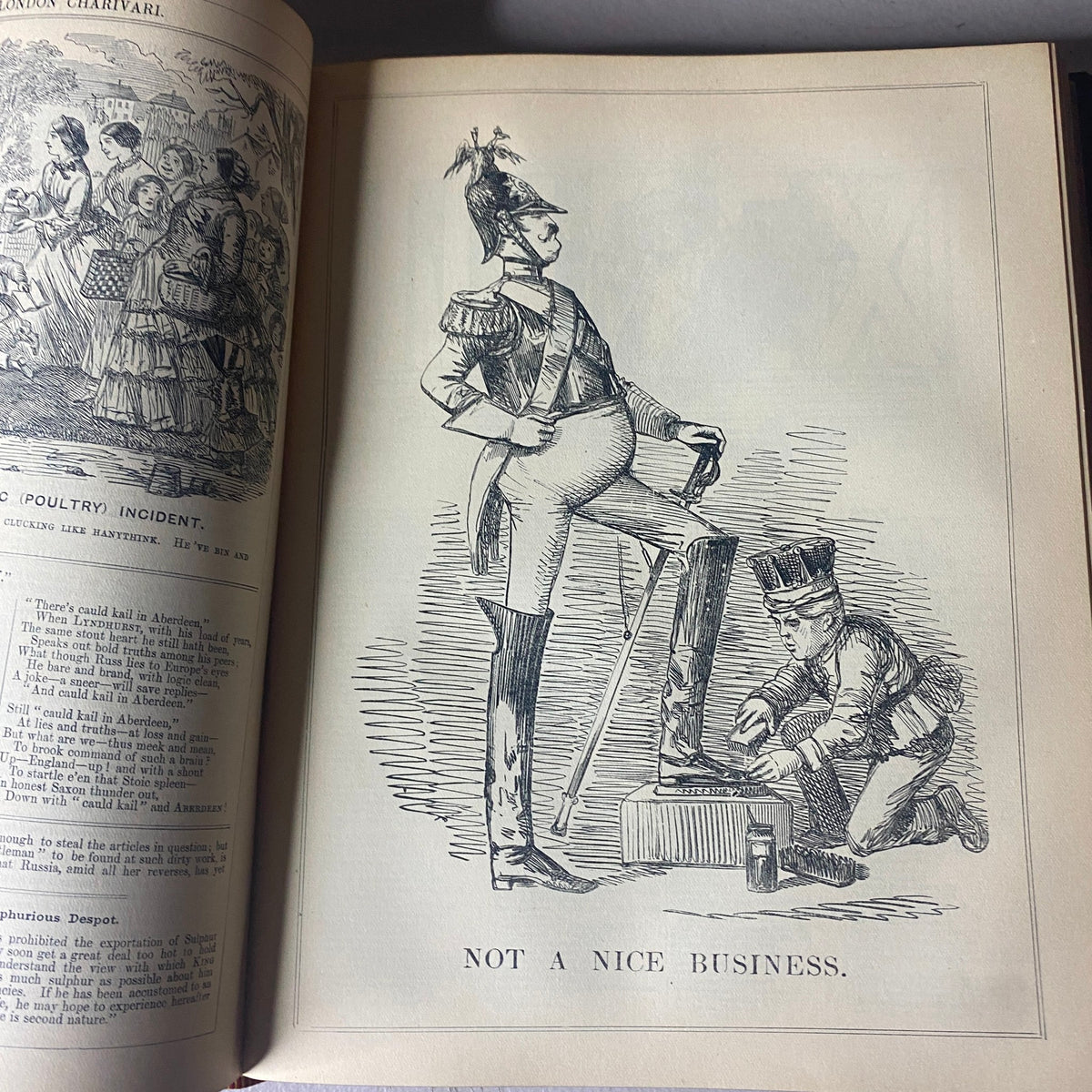 Illustration from VTG 1853 Complete January - December Bound Punch Magazine Volume XXV titled 'Not a Nice Business', depicting a soldier in a triumphant pose while a smaller character polishes his boot, presenting a satirical commentary on authority.