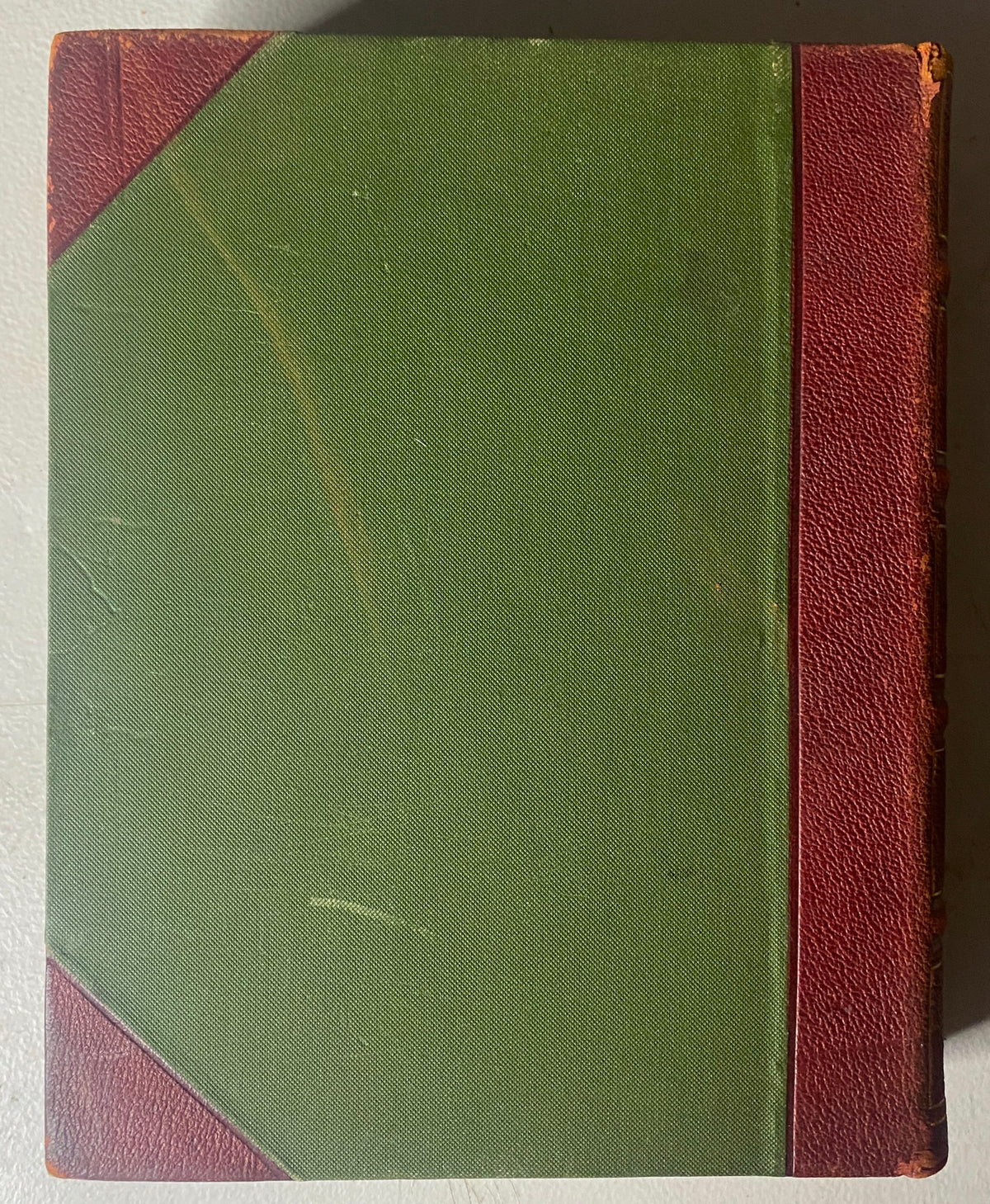 Cover image of the VTG 1853 Complete January - December Bound Punch Magazine Volume XXV, showcasing its vintage green and maroon binding.