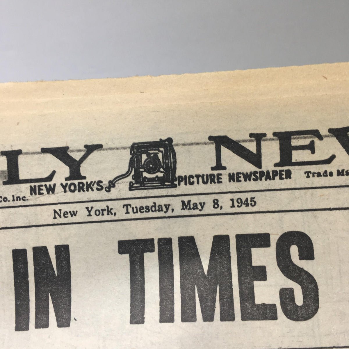 Header of the New York Daily News dated May 8, 1945, illustrating the publication's name and date, relevant to the historic announcement of the end of World War II in Europe.