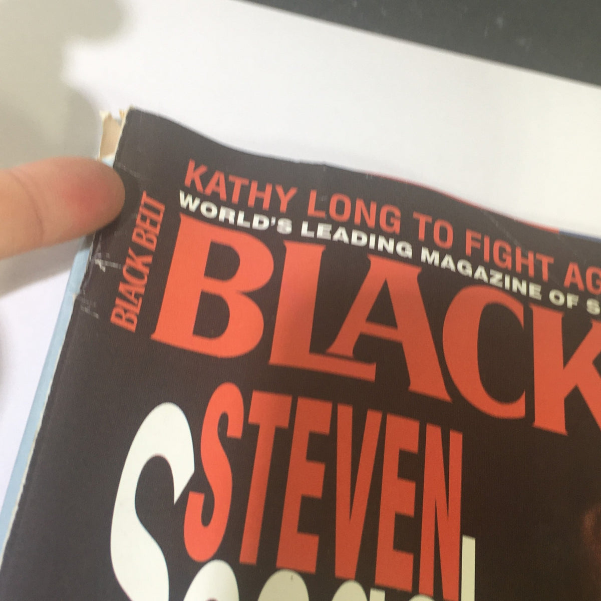 Detail of the top section of Black Belt Magazine July 1995, featuring the title and mention of Kathy Long, emphasizing it as the world's leading magazine of self-defense.