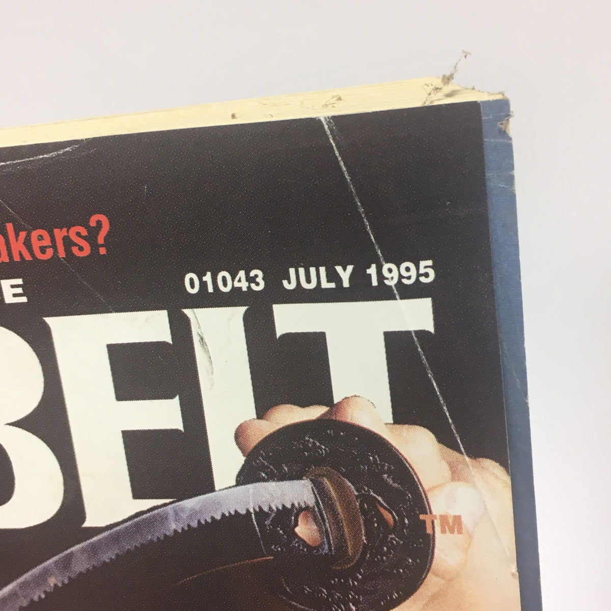 Top corner of Black Belt Magazine July 1995 displaying the issue number and date, along with an image of a martial arts weapon, capturing the essence of the magazine's focus on martial arts.