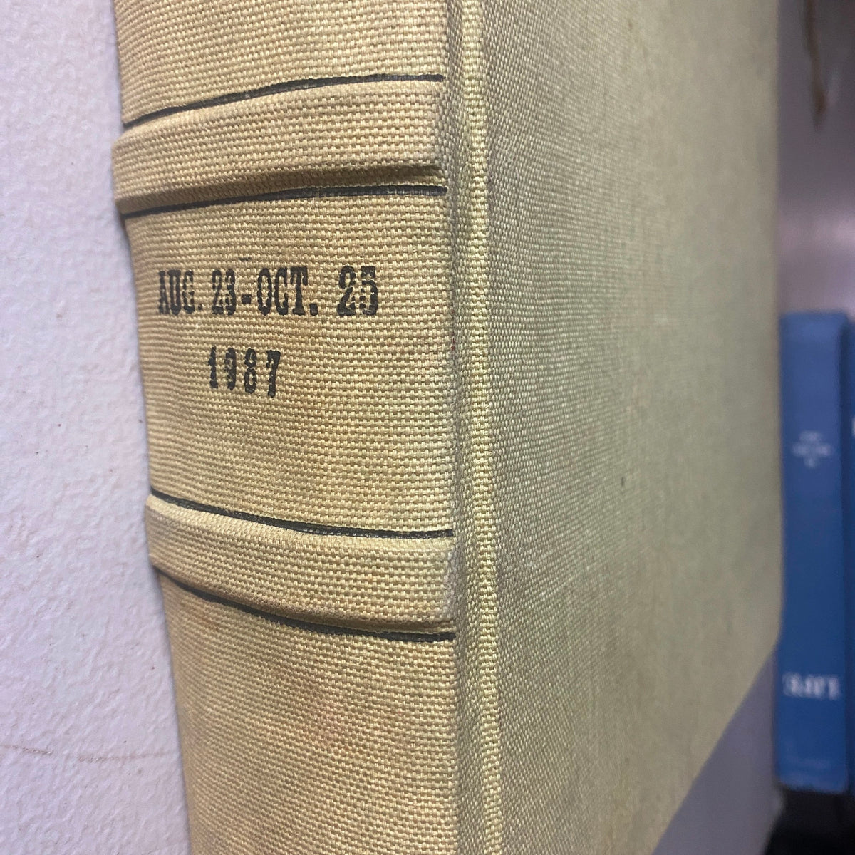 Detailed side view of VTG 1937 Bound Life Magazine displaying the embossed text 'AUG. 23-OCT. 25 1937' on a yellow fabric cover.