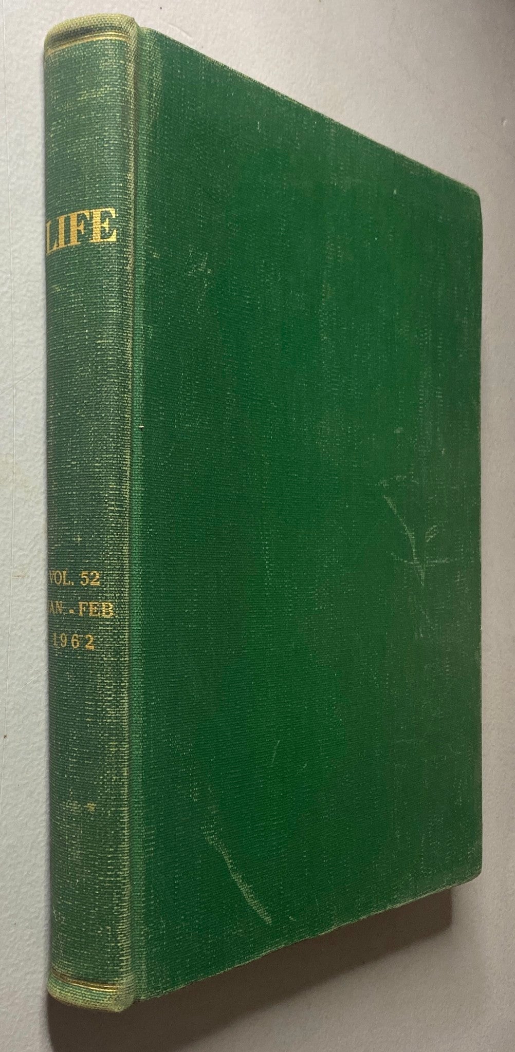 Spine view of the VTG 1962 Bound Life Magazine Vol. 52, showcasing the title and publication dates.