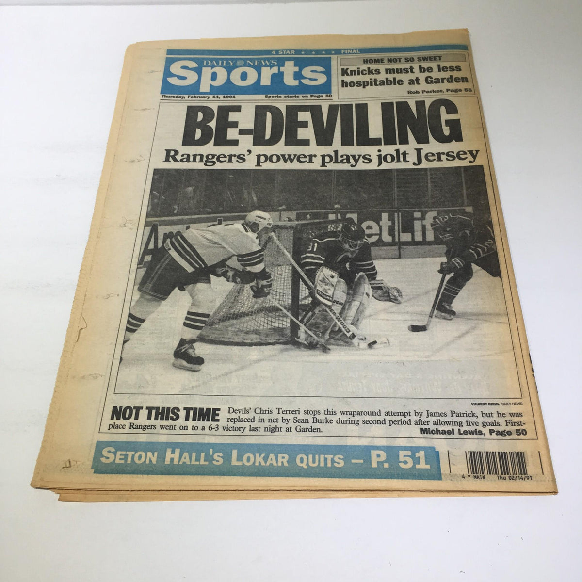 New York Daily News Sports section front page dated February 14, 1991, with the headline 'BE-DEVILING' covering a New York Rangers hockey game.